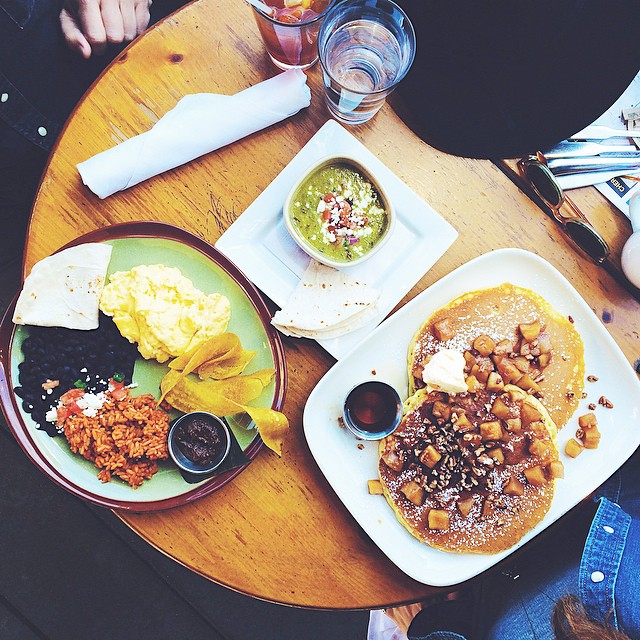 First non-Casa Bonita meal in #Denver: Squash and apple pancakes with tequila syrup and lemon better, and scrambled eggs with green chile, black beans, Spanish rice and fried plantains with spicy molasses dipping sauce. #delicious #Lola #Highlands