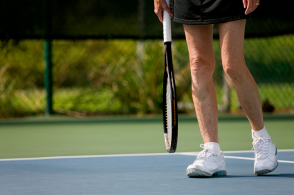 senior woman at the tennis court