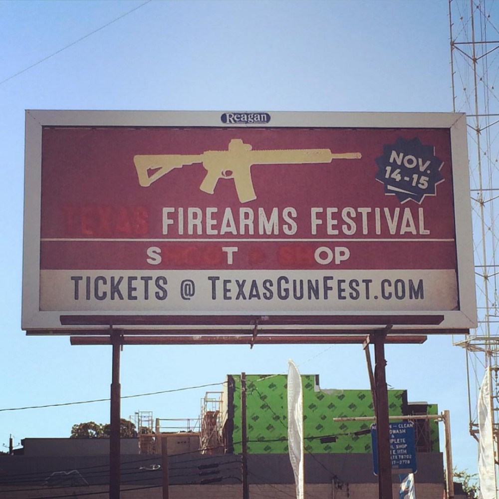 Someone really hates that billboard. // #eastaustin #guncontrol